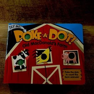 Interactive book with pop buttons for sensory fun